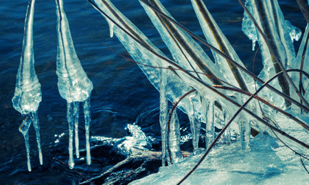 Icicle, ice stalactite sharpened downward when melting snow
