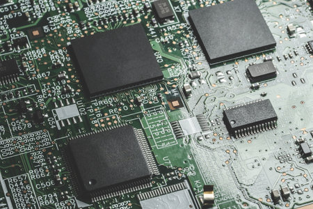 Macro Close-up Shot of Microchip, CPU Processor on Printed Circuit Board, Computer Motherboard with...