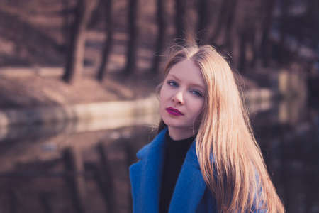 Blondy girl with bright pink lipsの写真素材