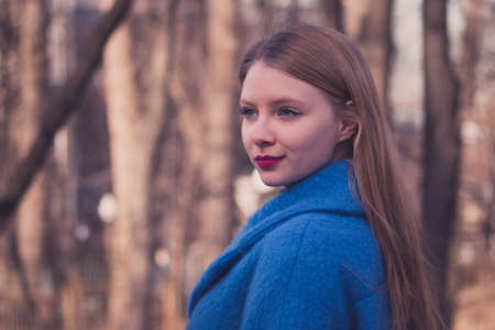 Blondy girl with bright pink lipsの写真素材