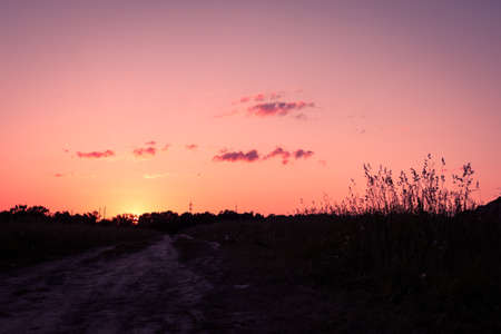 silhouette with the sunset sky backgroundの写真素材