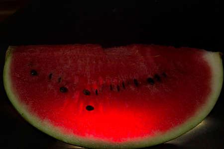 Watermelon (Citrullus lanatus) is a plant of the Cucurbitaceae family and its fruit. It is a creeping vine native to Africa.の写真素材