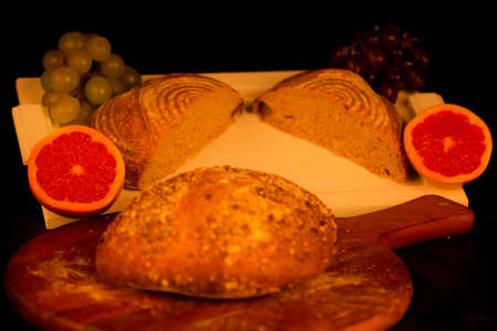 Bread is a staple food prepared from a dough of flour (usually wheat) and water, usually by baking.の写真素材
