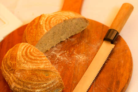 Bread is a staple food prepared from a dough of flour (usually wheat) and water, usually by baking.の写真素材