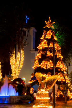 The city of Guararema, located in the metropolitan region of SÃ£o Paulo, promotes a special Christmas decoration every year. The square in front of the main church of Guararema boasts a huge well-decorated Christmas tree.の写真素材
