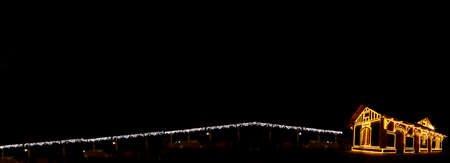 Railway station with Christmas lights in Guararema interior of SÃ£o Paulo.の写真素材