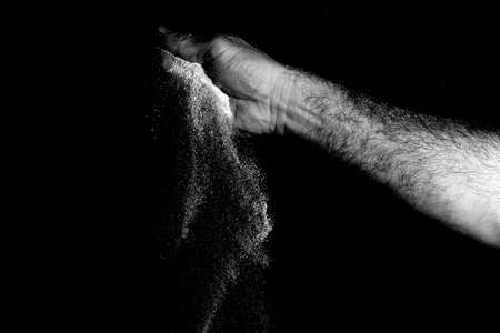 Cassava flour tossed to spread. Traditional food in many regions of Brazil. Creative colors and shapes using flour.の写真素材