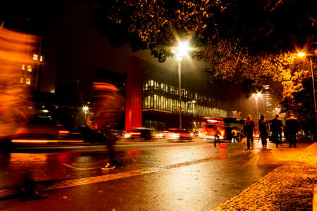 Avenida Paulista city of Sao Paulo, Brazil. Night image of the largest Brazilian financial and commercial center with its lights, people, cars, buildings and architecture.の写真素材