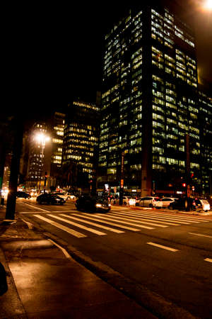 Avenida Paulista city of Sao Paulo, Brazil. Night image of the largest Brazilian financial and commercial center with its lights, people, cars, buildings and architecture.の写真素材