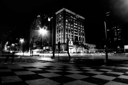 Avenida Paulista city of Sao Paulo, Brazil. Night image of the largest Brazilian financial and commercial center with its lights, people, cars, buildings and architecture.の写真素材