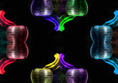 Water mixed with lighter fluid inside a golden pot throwing ice stone to cause thermal shock and cause a splash of liquid with fire on the black background.の写真素材