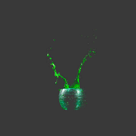 Water mixed with lighter fluid inside a golden pot throwing ice stone to cause thermal shock and cause a splash of liquid with fire on the black background.の写真素材