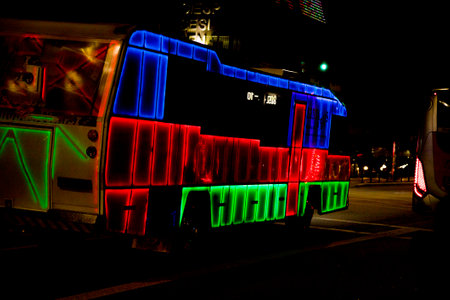 Colorful bus at night on Avenida Paulista, Sao Paulo, Brazil. Night photography.の写真素材