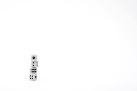 Stack of dices over white backgroundの写真素材