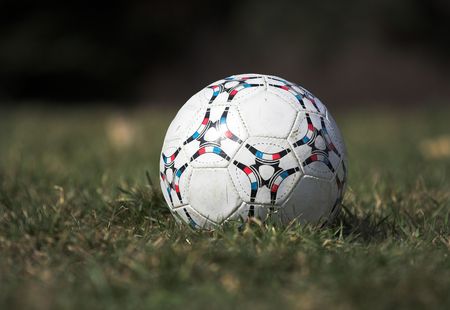 Soccer ball on the grassの写真素材