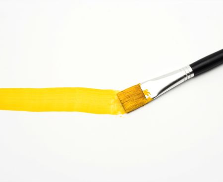 Yellow line and brush over whiteの写真素材