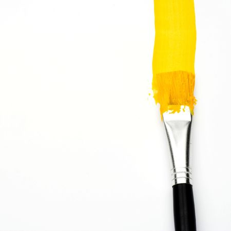 Yellow line and brush over whiteの写真素材