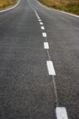 the asphalt road marks close の写真素材