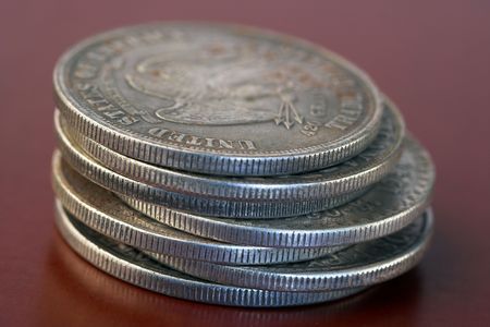stack of silver coins close up
