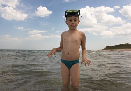 boy with scuba mask in the seaの写真素材
