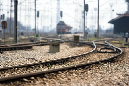 View of rail station selective focus on the tracksの写真素材