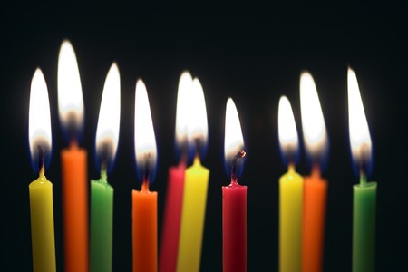 Some lit birthday candles close upの写真素材