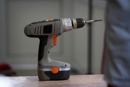 cordless drill  on working tableの写真素材