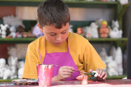 portrait of a painting boyの写真素材