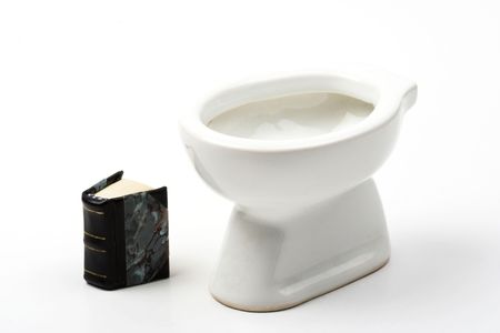 reading in the bathroom - bowl and book over whiteの写真素材