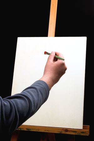 canvas,hand with brush and easel in black background
の写真素材