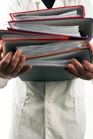  man holding a pile of file folders
の写真素材