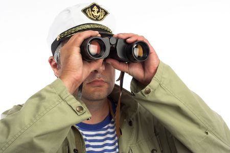 seaman with binoculars over whiteの写真素材