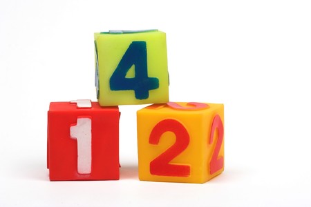 Educational  blocks with different numbers over white の写真素材