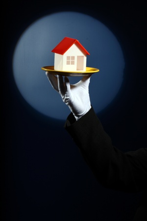 Model of house on the tray. Real estate concept の写真素材