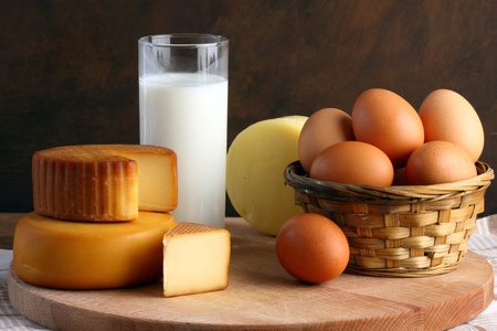 Several types of cheese, milk and eggsの写真素材