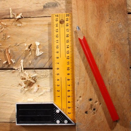 square and carpente's pencil on the workshopの写真素材