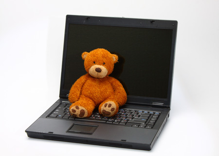 teddy bear abandoned because new digital toysの写真素材