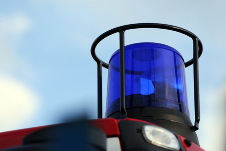 blue flashing light on the fire vehicleの写真素材