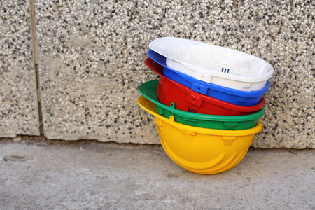 a pile of different colored helmets close upの写真素材