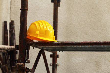 Yellow helmet on work place