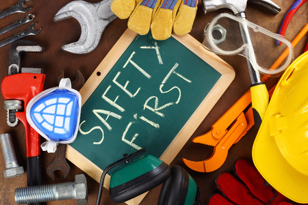 tools and board with the inscription SAFETY FIRSTの写真素材