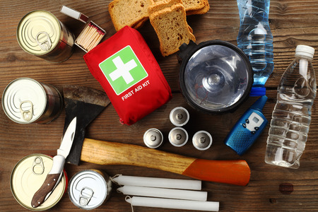 Items for emergency on wooden tableの写真素材