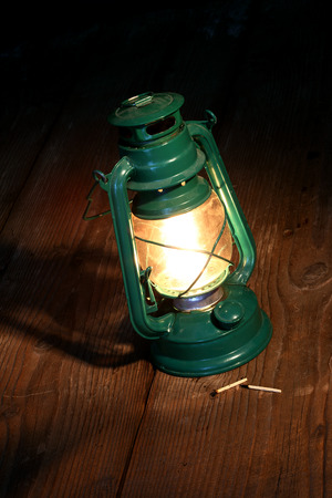 kerosene lamp in the darkの写真素材
