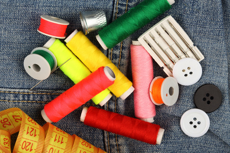 Colorful sewing supplies close up 