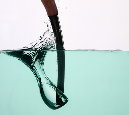 hand made clonk fishing tool in actionの写真素材