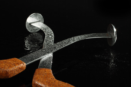 handmade clonk fishing tools over blackの写真素材