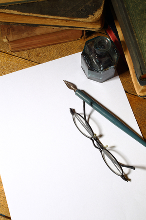 vintage pen and blank sheetの写真素材