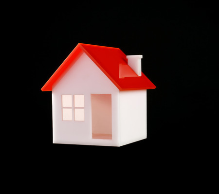 model of a house over black backgroundの写真素材