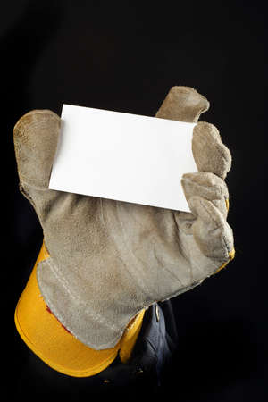 worker holding a blank cardの写真素材