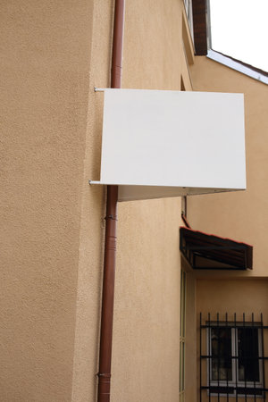 Blank white  signboard on the wallの写真素材